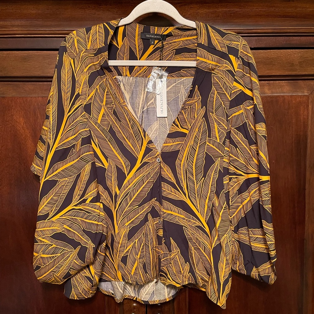 Olivaceous top